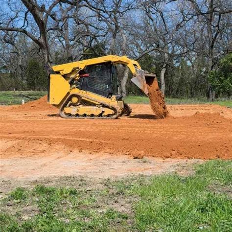 grading driveway with skid steer